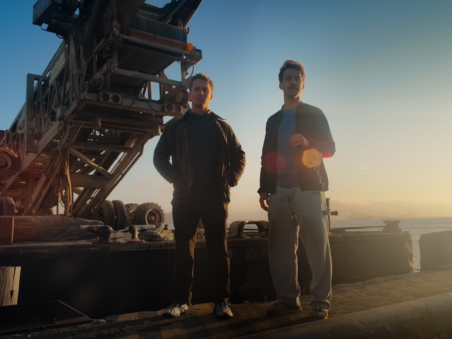 Atomarine founders at dock at sunset